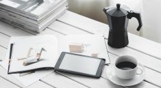 Technology, tablet, coffee cup — How Forex Markets Impact the Global Economy
