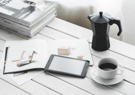 Technology, tablet, coffee cup — How Forex Markets Impact the Global Economy