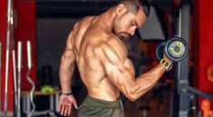 A fit, shirtless man showcasing biceps while lifting a dumbbell in a gym setting. — Natural Care and Balance with Ayurvedic M