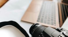 Laptop, camera, desk — White Label SEO: A Scalable Solution for Small Agencies